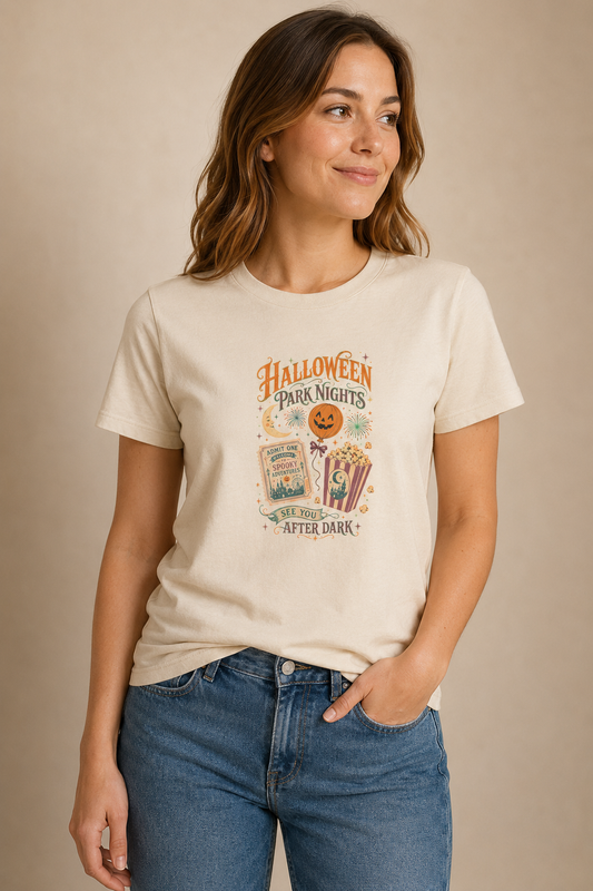 Woman wearing a beige Halloween Park Nights graphic T-shirt