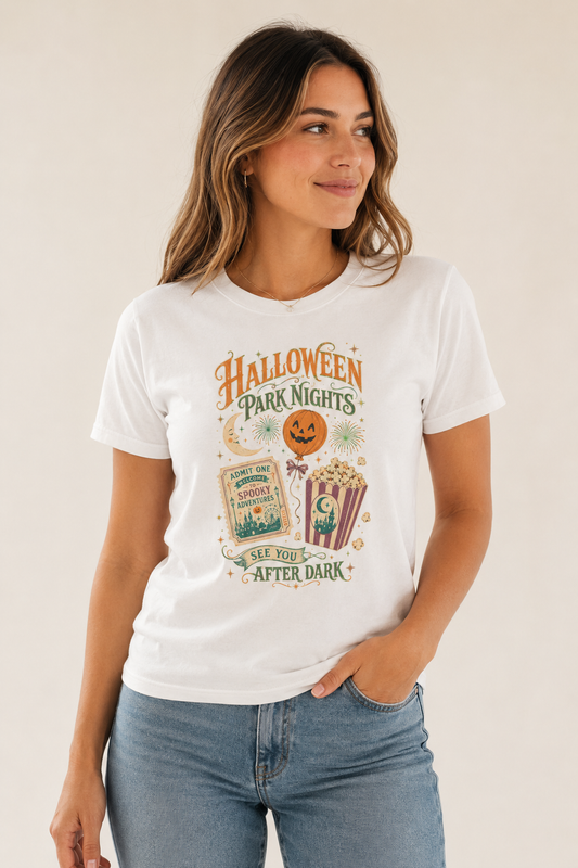 Woman wearing a white Halloween Park Nights graphic T-shirt