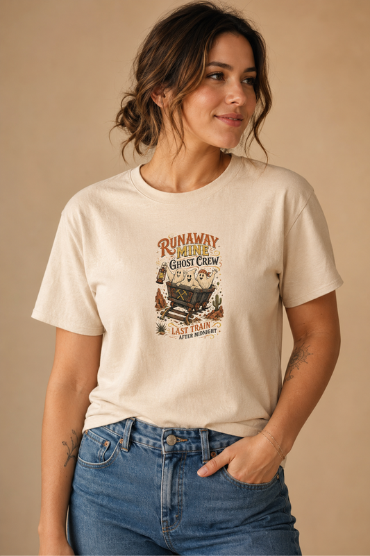 Woman wearing a beige Runaway Mine Ghost Crew graphic T-shirt