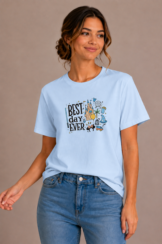 Woman wearing a blue crew-neck t-shirt with the 'Best Day Ever' theme park doodle design printed on the chest