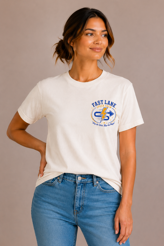Woman wearing a sand crew-neck t-shirt with the 'Fast Lane Speed Crew' lightning-bolt badge design printed on the chest