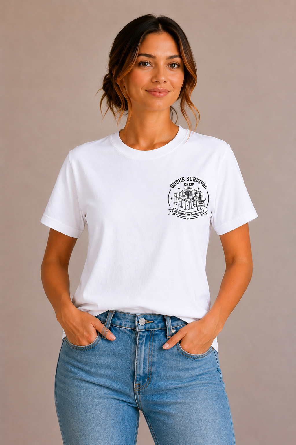 Woman wearing a white crew-neck t-shirt with the 'Queue Survival Crew – We Waited, We Conquered' queue-line badge design printed small on the chest
